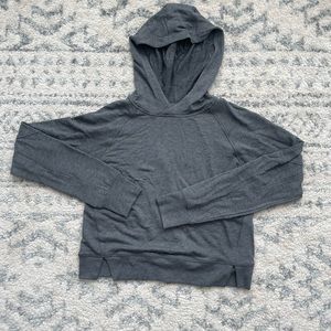 All in motion, hooded crop top with thumb holes, size xs in new condition.